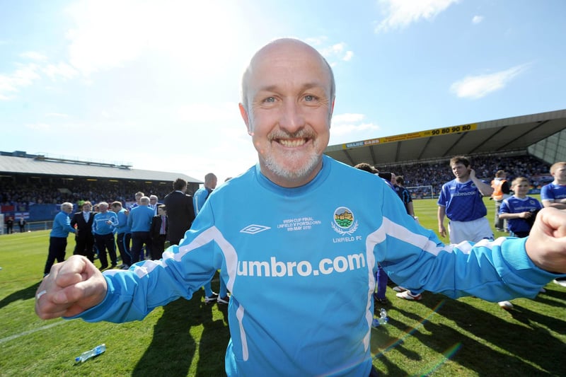 Linfield assistant manager Alfie Wylie celebrates winning the Irish Cup