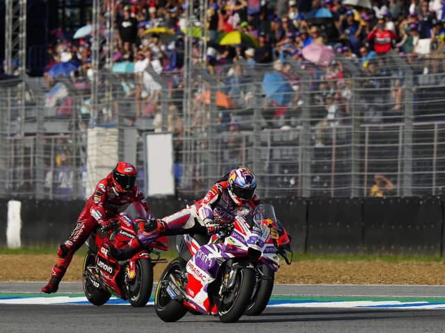 Epic race for victory in the Thailand MotoGP between eventual winner Jorge Martin (89), Brad Binder and Pecco Bagnaia.