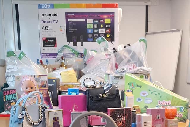 The suspected stolen goods recovered appeared to include a 40 inch television.
