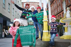Belfast's Victoria Square has lots of free Christmas family fun for everyone to enjoy this weekend. Pictured are Peter Corry festive performer Maeve Smyth, DJ Ryan Hand, and brothers – Grayson, Austen and Hudson Todd are all Christmas jumper ready for Victoria Square’s special Christmas jumper party that takes place on Sunday as part of Belfast’s number one shopping destination’s official Christmas launch weekend