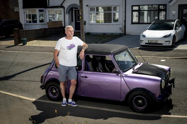 Karl Amos, a 53 year-old plumbers merchant in Hillingdon, West London with his 1985 Classic Mini which does not meet the ULEZ emissions standard when the boundary expands.