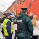 The scene on the Ormeau Road in February 2021 after two PSNI officers investigated a possible breach of Covid regulations. Photo: Pacemaker