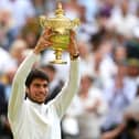 Carlos Alcaraz with the Gentlemen's Singles Trophy following his victory over Novak Djokovic on day fourteen of the 2023 Wimbledon Championships at the All England Lawn Tennis and Croquet Club in Wimbledon. PIC: Victoria Jones/PA Wire.