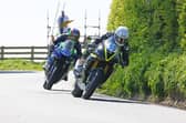 Darryl Tweed (Stanely Stewart by NovoGen Triumph) and Michael Sweeny (EM Building Yamaha) during Supersport qualifying at the Bear Competitions Cookstown 100. (Photo by Rod Neill/Pacemaker Press)