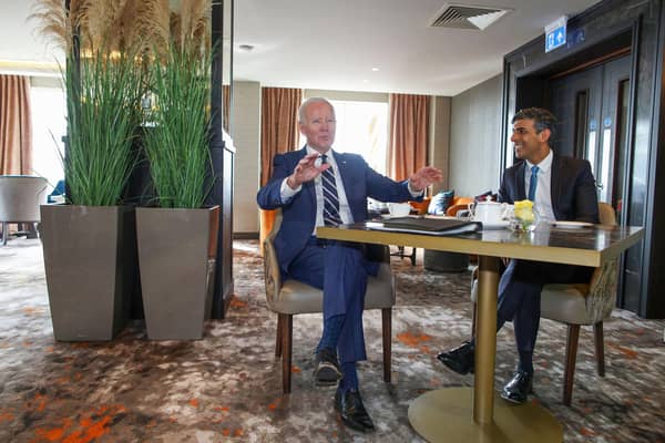 Prime Minister Rishi Sunak (right) meets with US President Joe Biden at the Grand Central Hotel in Belfast, during his visit to the island of Ireland. Picture date: Wednesday April 12, 2023.
