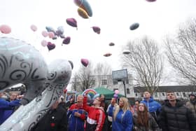 Balloons are released during a memorial event for Chloe Mitchell at King George's Park, Ballymena. Ms Mitchell, who was found dead in Ballymena last summer, would have celebrated her 22nd birthday on Tuesday