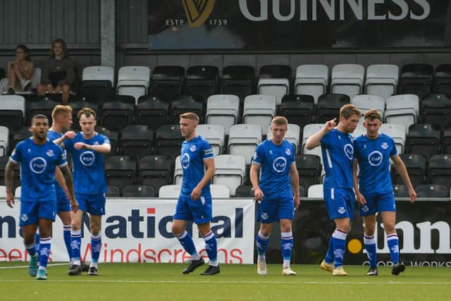Loughgall players celebrate BenjI Magee's equaliser against Crusaders at Seaview