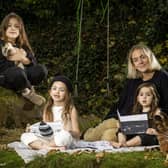 Ciara Tinney with her children Adabelle aged 8, Fiadh Ros aged 5 and Birdie Blue aged 3 who are wearing her Wildkind Irish linen Collection. Picture: Liam McBurney/PA Wire