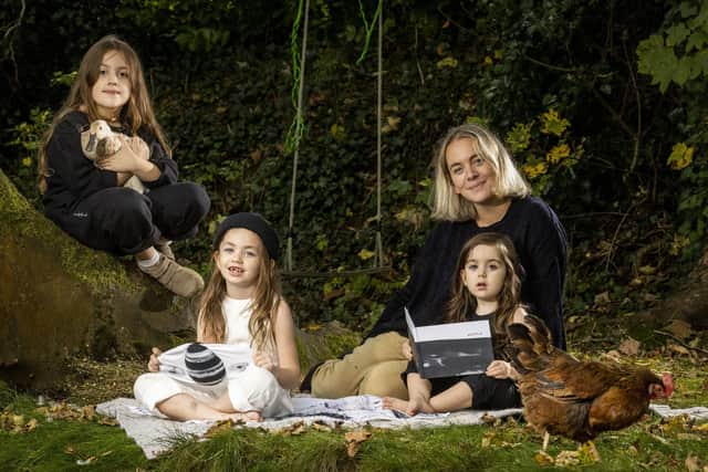 Ciara Tinney with her children Adabelle aged 8, Fiadh Ros aged 5 and Birdie Blue aged 3 who are wearing her Wildkind Irish linen Collection. Picture: Liam McBurney/PA Wire