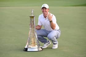 Rory McIlroy poses with the Race to Dubai trophy on the 18th green during Day Four of the DP World Tour Championship on the Earth Course at Jumeirah Golf Estates
