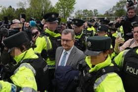 Former DUP leader Jeffrey Donaldson leaving Newry Magistrates' Court, after he was released on bail for child sex abuse charges in April 2024.