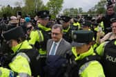 Former DUP leader Jeffrey Donaldson leaving Newry Magistrates' Court, after he was released on bail for child sex abuse charges in April 2024.