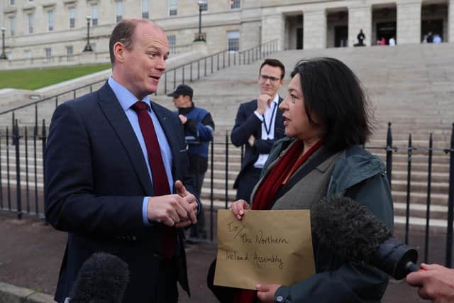 Marina Hampton from the Equity Union delivers a letter of No Confidence to Communities Minister Gordon Lyons during a protest by actors, playwrights and members of the creative industry outside the Northern Ireland Assembly at Stormont. Pic: Liam McBurney/PA Wire