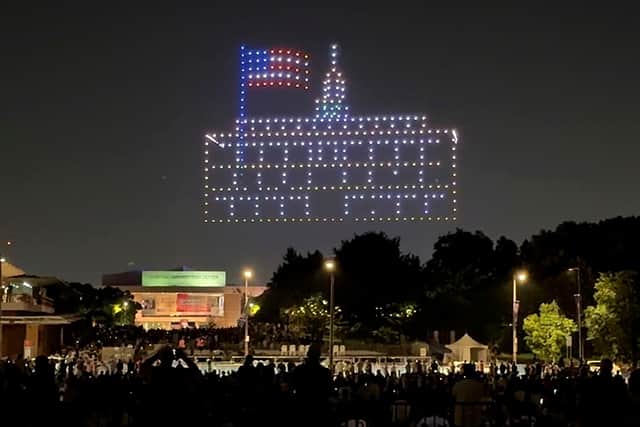 Drones put on a show in the sky near independence hall in Philadelphia on Thursday night. Pic: AP Photo/Jack Auresto