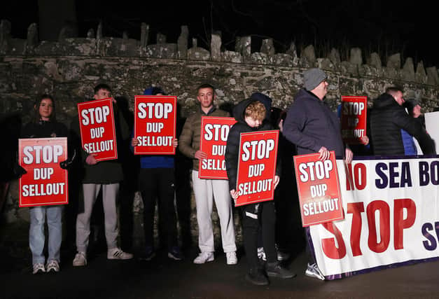 ​Anti-protocol protestors gathered outside Larchfield Estate on Monday night before the DUP executive meeting began.   Pic: Jonathan Porter/PressEye