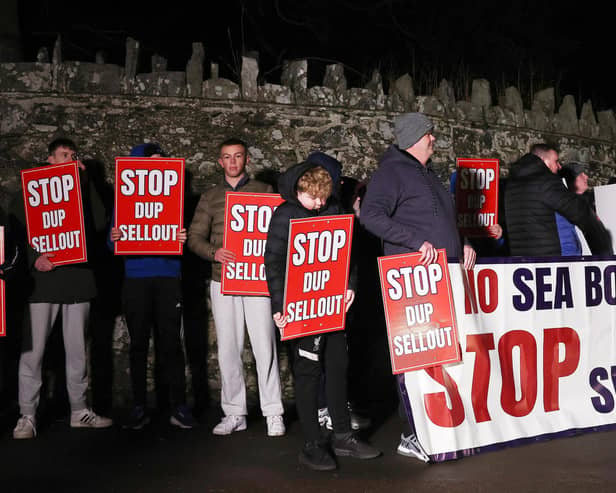 ​Anti-protocol protestors gathered outside Larchfield Estate on Monday night before the DUP executive meeting began.   Pic: Jonathan Porter/PressEye