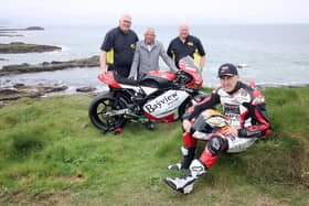 Pictured launching the 2024 Armoy Road Races are from left, Bill Kennedy, Director, Trevor Kane, owner of the Bayview Hotel and William Munnis, Chairman and Clerk of the Course with motorcycle racer Jeremy McWilliams, who is racing this week at the NW200