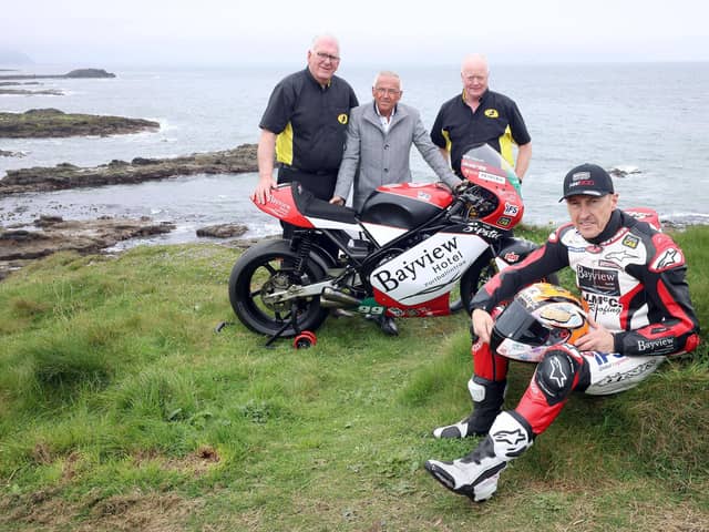 Pictured launching the 2024 Armoy Road Races are from left, Bill Kennedy, Director, Trevor Kane, owner of the Bayview Hotel and William Munnis, Chairman and Clerk of the Course with motorcycle racer Jeremy McWilliams, who is racing this week at the NW200