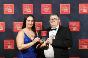 Castlederg retailer bags prestigious national award in London. Pictured is Alison Logue and Charlie Hamilton from Hamilton's SPAR with their award for Independent Fresh Produce Retailer of the Year at the Retail Industry Awards in London