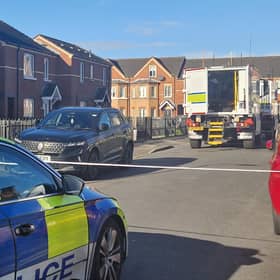 Police vehicles on the scene in North Belfast this morning. Photo: Iain Gray/News Letter