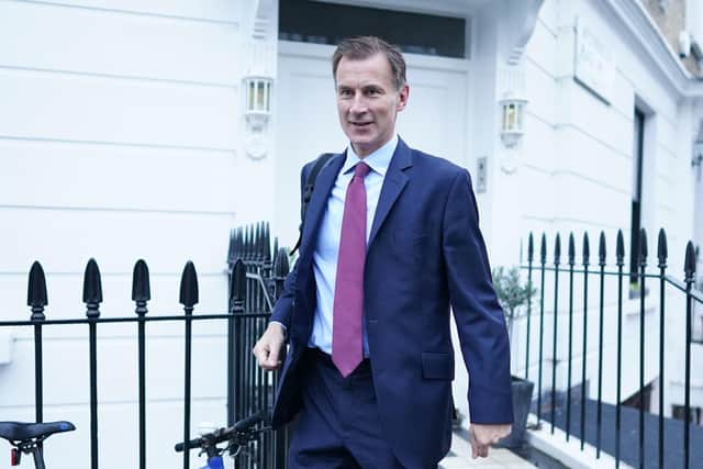 Chancellor of the Exchequer Jeremy Hunt leaves his home in London yesterday as he prepared to deliver today’s autumn statement