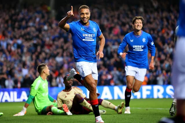 Rangers' Cyriel Dessers celebrates scoring his side's second goal during the UEFA Champions League third qualifying round, first leg match at the Ibrox Stadium, Glasgow