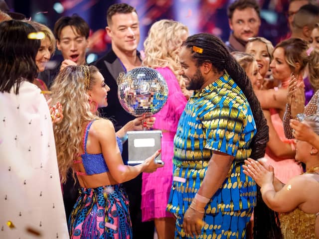 Hamza Yassin and Jowita Przystal with their trophy after winning Strictly Come Dancing 2022