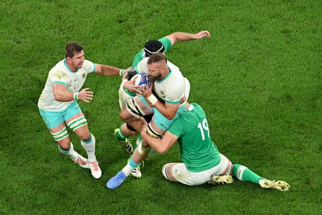 Ireland's Iain Henderson tackling RG Snyman on the way to a memorable defeat of South Africa. (Photo by Matthias Hangst/Getty Images)