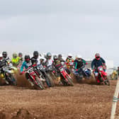 Jason Meara (10) leads the MX1/MX2 Experts into Turn 1 at the Knock Club's meeting at St. John's Point. Picture: Maurice Montgomery