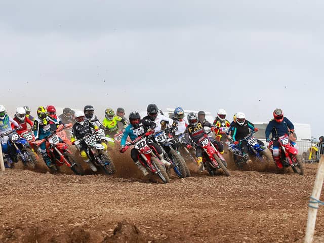 Jason Meara (10) leads the MX1/MX2 Experts into Turn 1 at the Knock Club's meeting at St. John's Point. Picture: Maurice Montgomery