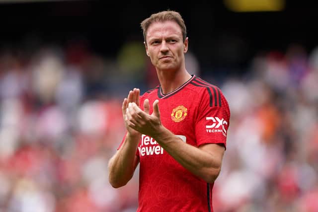 Manchester United’s Jonny Evans applauds the fans after a pre-season friendly match. The Northern Ireland international joined on a short-term deal to cover United’s pre-season fixtures in July