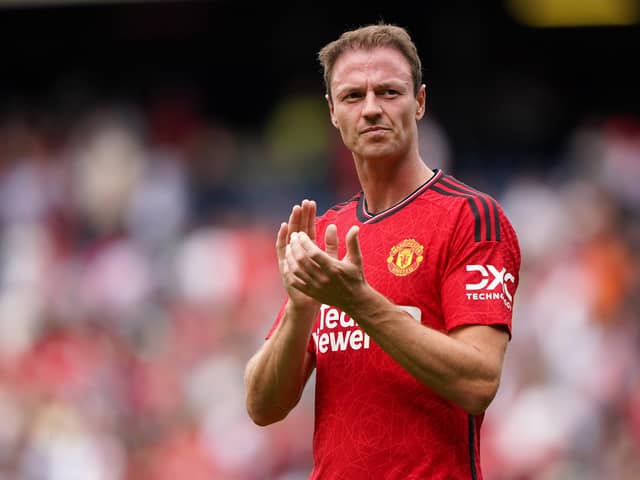 Manchester United’s Jonny Evans applauds the fans after a pre-season friendly match. The Northern Ireland international joined on a short-term deal to cover United’s pre-season fixtures in July