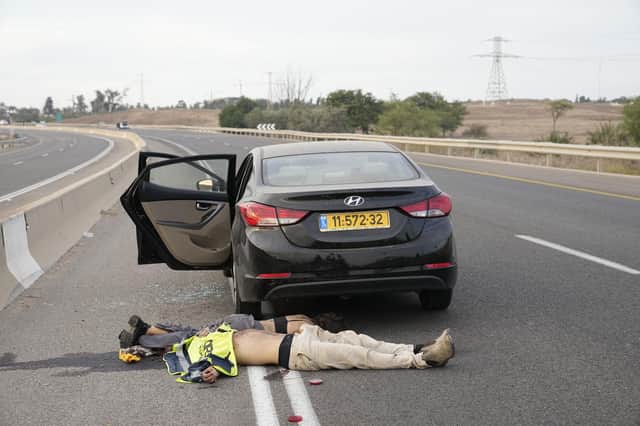 Israelis killed by Palestinian terrorists are seen near Sderot, Israel, on Saturday, Oct. 7, 2023. ​Judge Hamas by their own unambiguous words, and read their genocidal anti-semitic commitment in their own covenant (AP Photo/Ohad Zwigenberg)