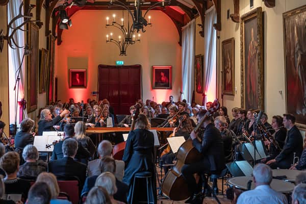 ​Barry Douglas (left) conducts the Camerata Ireland Orchestra during Saturday night's performance at the Clandeboye Estate Banqueting Hall.  Pic: Neil Harrison Photography
