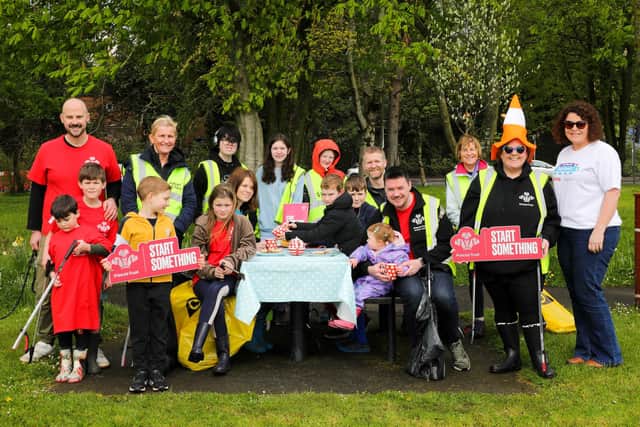 Grainne McCloskey, Scotland and Northern Ireland Regional Manager, Eden Project Communities, is joined at the first Coronation Big Lunch by Prince's Trust Andy Briggs and family, junior parkrun volunteer Barbara Zboralska and family, Prince's Trust Enterprise Manager Jonny McKim and his daughter, junior parkrun volunteers Mark Cunningham and Anne Magee, and Prince's Trust and junior parkrun volunteer Karolyn Gaston and family. Visit www.thebiglunch.com.