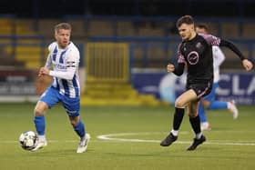 Coleraine full-back Lyndon Kane in action against Loughgall's Jordan Gibson at The Showgrounds