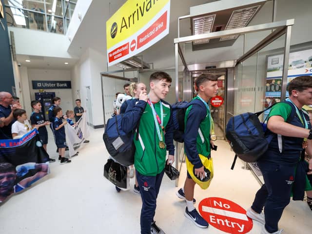 Jude Gallagher (left) pictured two years ago after returning home from the Commonwealth Games in Birmingham