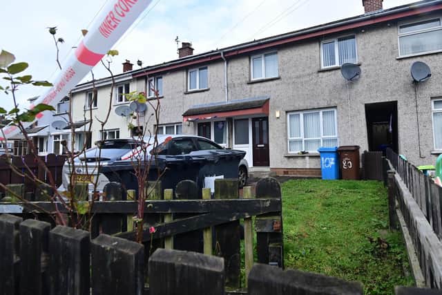 Flowers at the scene  of the murder of Liam Christie who was shot  up to four times at close range in Antrim. Neighbours raised the alarm at about 09:00 GMT on Thursday after finding the body at a house in the Craighill area. Pic Colm Lenaghan/Pacemaker