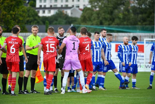 Newry and Loughgall players before this afternoon's game at Newry Showgrounds, Newry. PIC: Andrew McCarroll/ Pacemaker Press
