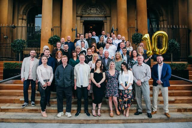 Northern Ireland’s largest hospitality group, Beannchor managing director, Bill Wolsey and group marketing director, Petra Wolsey pictured with some of the 60-plus employees that are celebrating long-service with the hospitality group