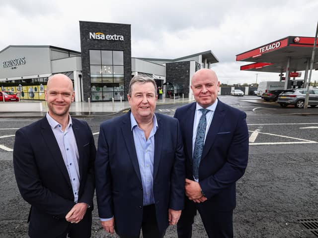 Ballymena-based supermarket, Robinsons has invested £4million in a shop refit and extension which sees the Nisa Extra more than double in size, with support from Danske Bank. Pictured are Peter Houston, head of Danske Bank, North Finance Centre, Finlay Robinson, owner of Robinsons Nisa Extra and Mark Brown, business acquisition manager, Danske Bank