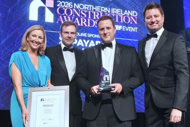 Adrian Pollock, operations director (Civils) at construction and civil engineering firm McLaughlin & Harvey, pictured receiving the Outstanding Contributor award at the 2026 Northern Ireland Construction Awards