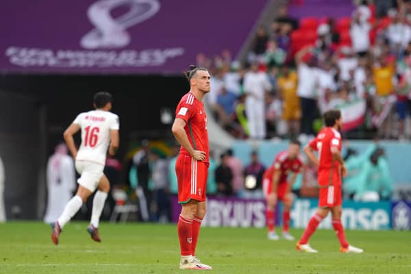 Wales' Gareth Bale looks dejected after the FIFA World Cup Group B match against Iran at the Ahmad Bin Ali Stadium, Al-Rayyan.
