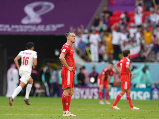 Wales' Gareth Bale looks dejected after the FIFA World Cup Group B match against Iran at the Ahmad Bin Ali Stadium, Al-Rayyan.