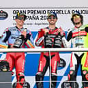Pecco Bagnaia (centre) celebrates his Spanish GP win with, from left, Marc Marquez and Marco Bezzecchi. (Photo by MotoGP)