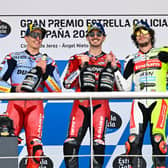 Pecco Bagnaia (centre) celebrates his Spanish GP win with, from left, Marc Marquez and Marco Bezzecchi. (Photo by MotoGP)