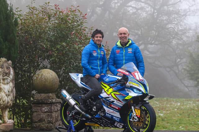 Burrows Engineering/RK Racing team owner John Burrows pictured at Parkanaur College in Dungannon with Mike Browne and the BMW M1000RR Superstock machine he will ride along with a top-spec M1000RR Superbike in 2023. Picture: Baylon McCaughey