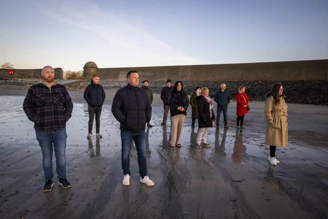 Victims and survivors of the Troubles gather in  Killough, Downpatrick, Co Down, to watch the sun rise to mark the 25th anniversary of the Good Friday Agreement. Picture:  Liam McBurney/PA Wire