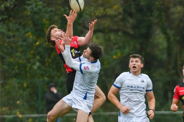 City of Armagh's Dylan Nelson battling against Cork Constitution at the Palace Grounds. (Photo by Andrew McCarroll/Pacemaker Press)