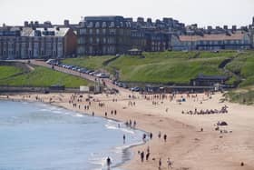 People on Tynemouth Beach in the North East of England today (Sunday). Heatwave conditions are forecast for parts of the UK this weekend as temperatures rise, with some areas set to be hotter than Barbados. Picture: Owen Humphreys/PA Wire